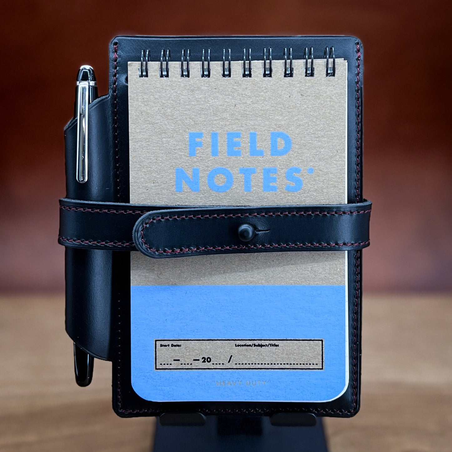 Handmade Jotter Style Cover for Field Notes Heavy Duty Flip Notebook in Black CXL Horween Leather with old style non-adjustable wrap.