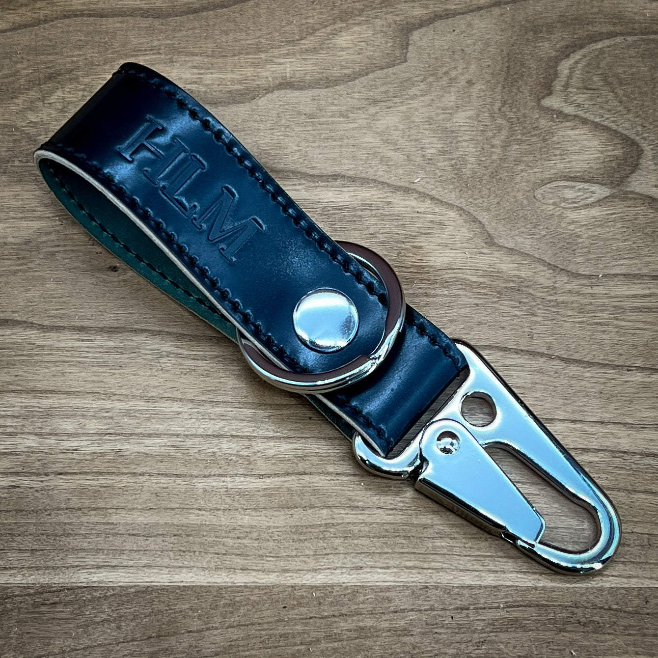 Dark Blur Shell Cordovan Clip Keychain with nickel hardware.