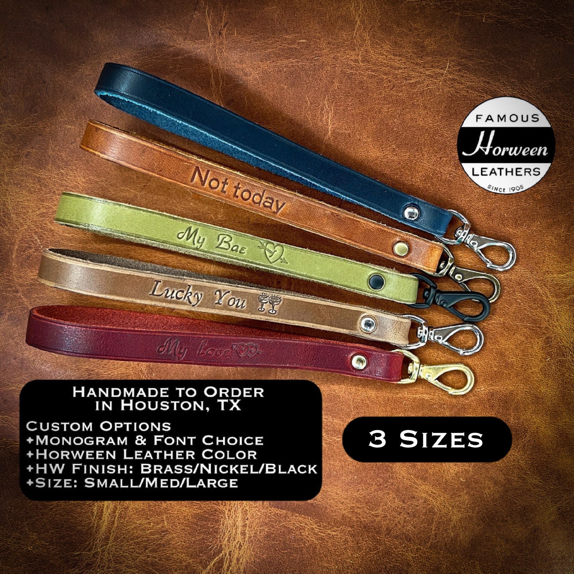 Three sizes of leather wristlet keychains in red, natural CXL, english tan and cobalt blue horween leathers by Custom Leather and Pen