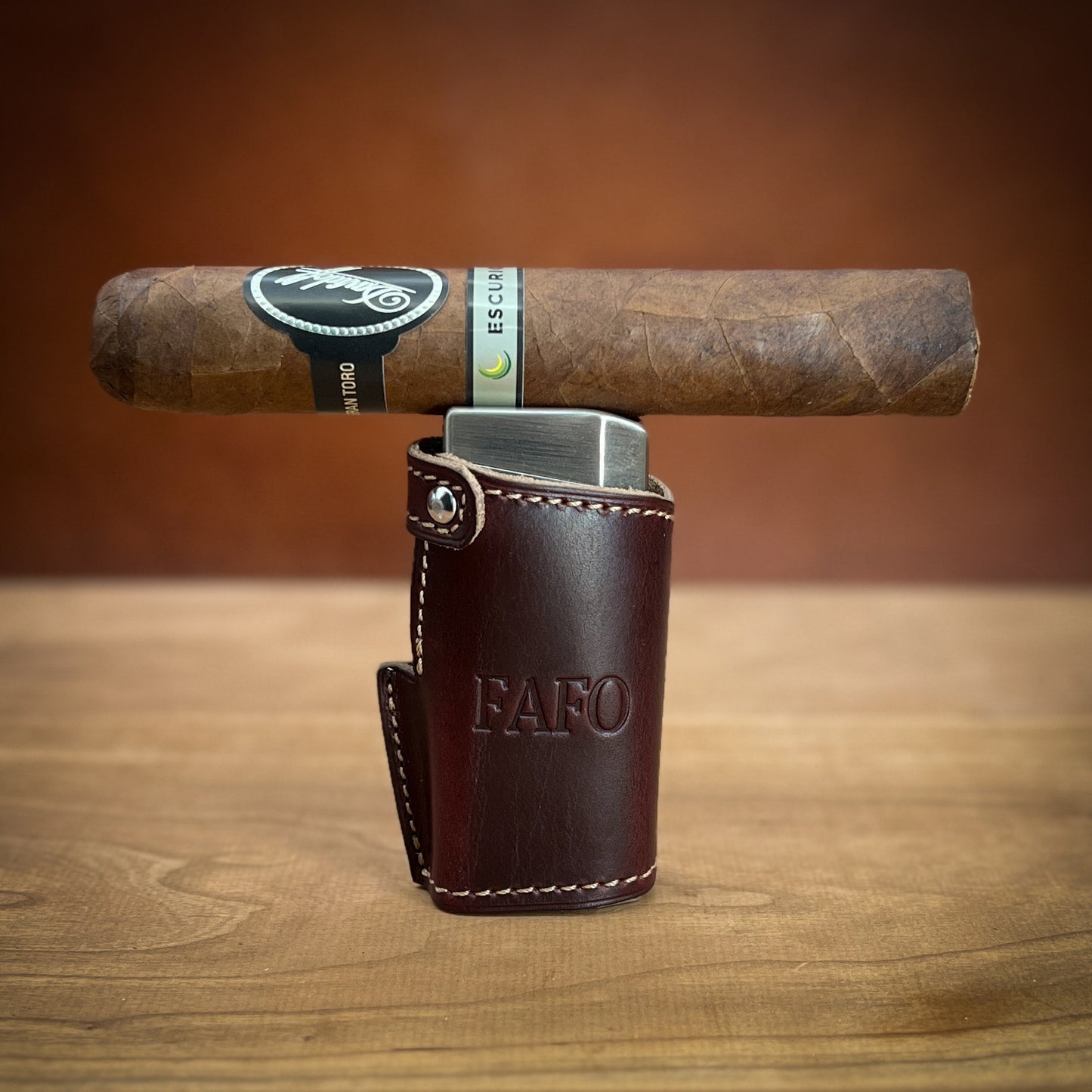 Custom Leather Cigar Lighter Case in Number 8 Horween Leather with Beige Stitching.  Handmade to order by Custom Leather and Pen in Houston, TX