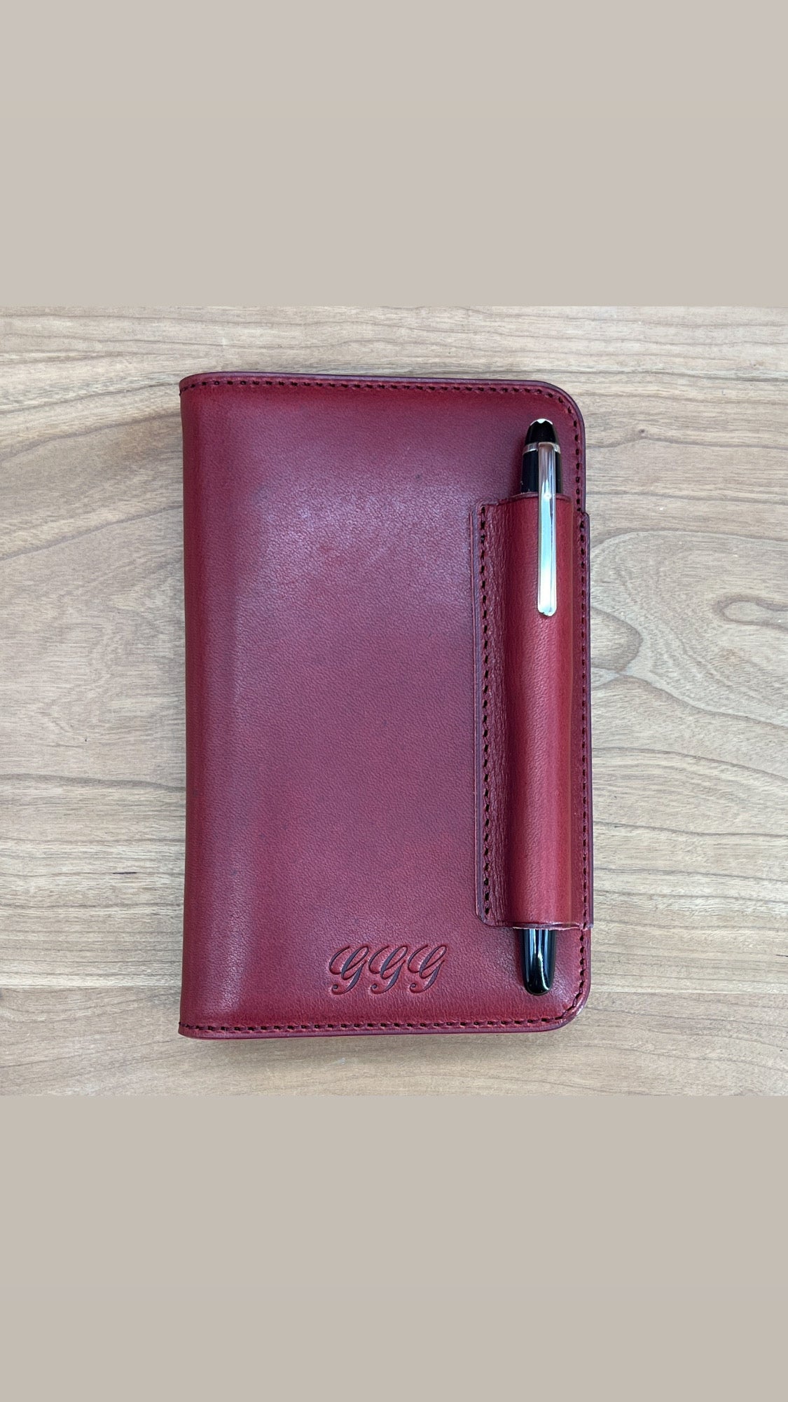 Handmade London Red Horween Leather Notebook Cover for Pocket Notebooks.