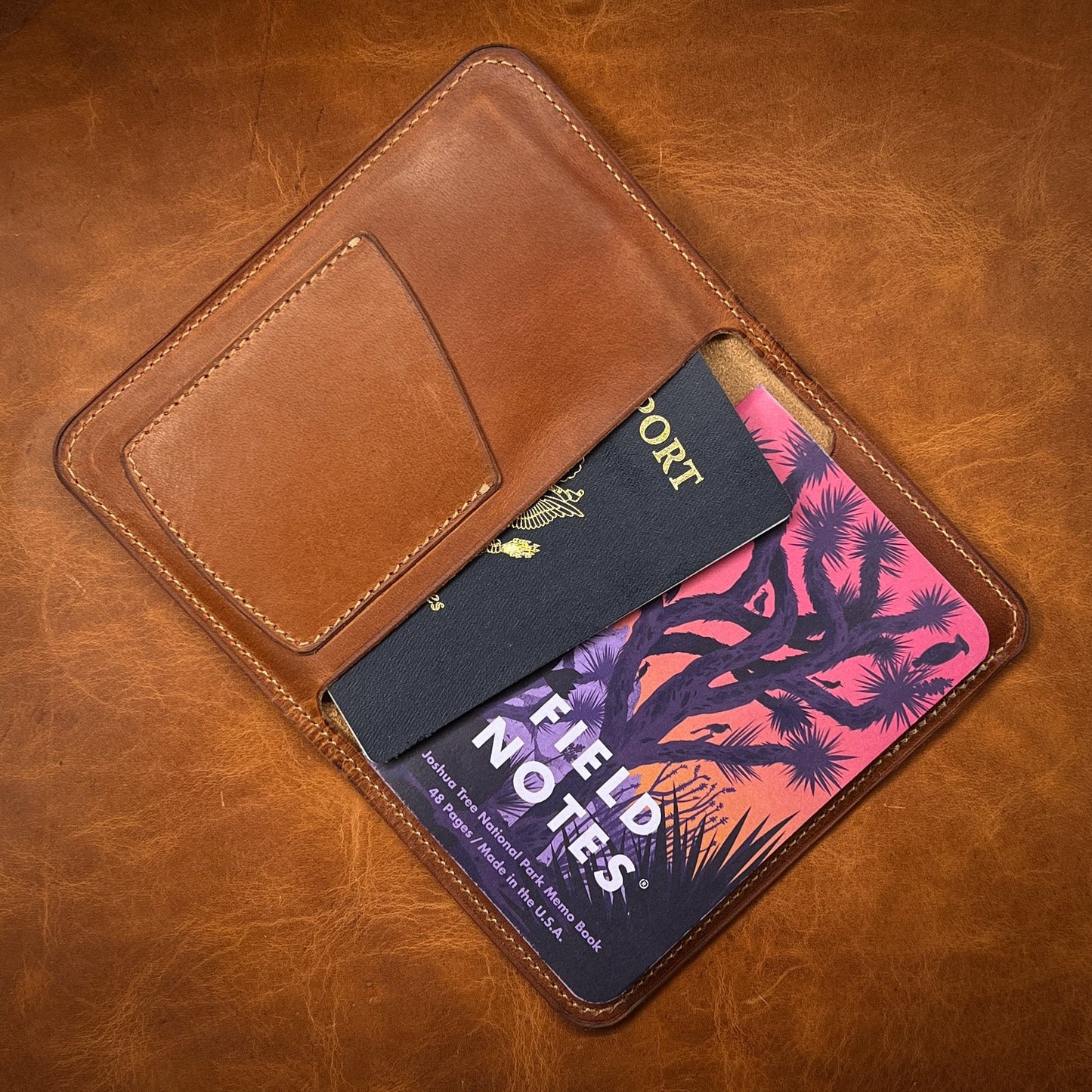 Beautiful Handmade Horween Leather Passport and Notebook cover. Made by Custom Leather and Pen in Houston, TX