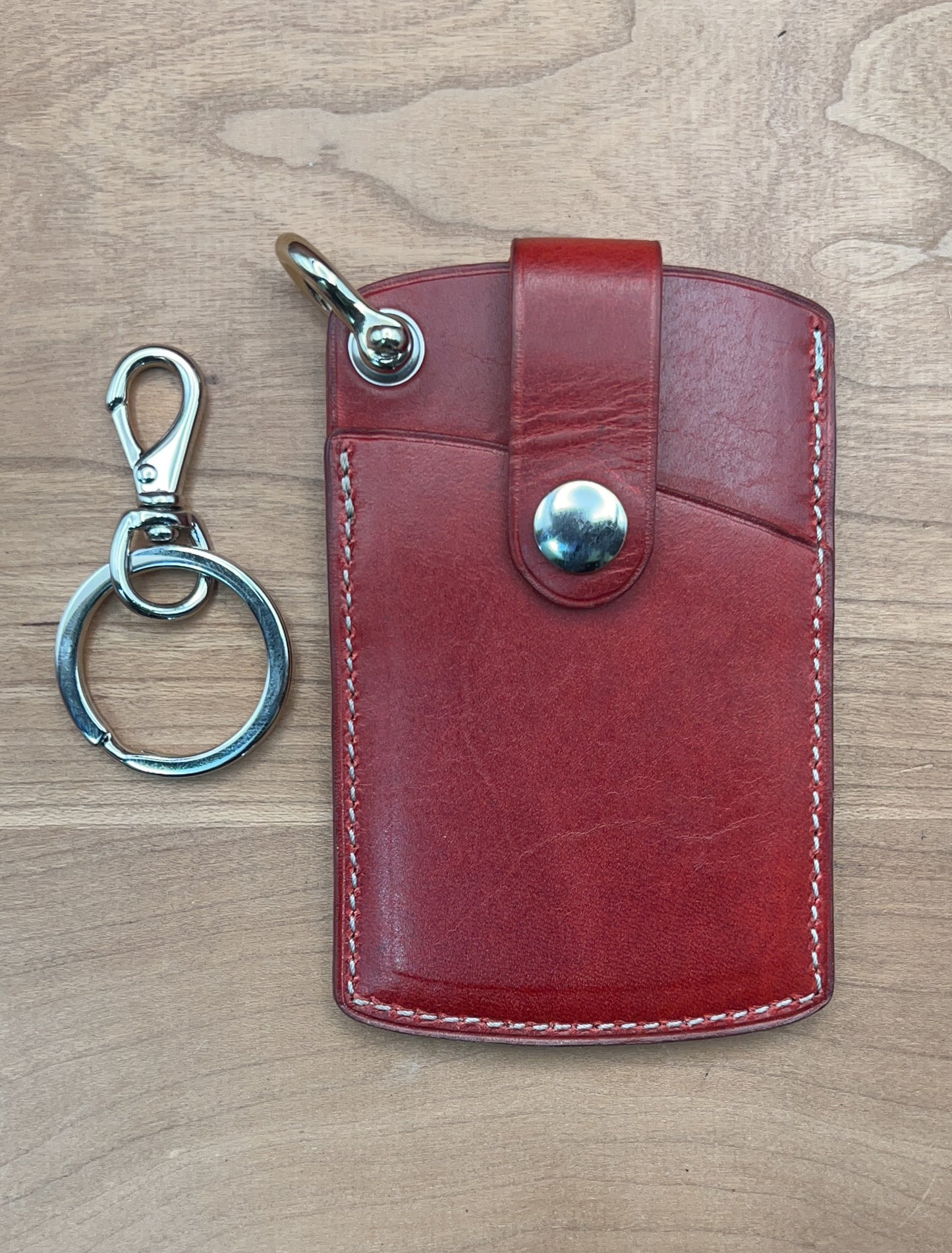 Handmade Leather Keychain Wallet in London Red Horween leather with nickel hardware. Handcrafted by CustomLeatherAndPen.