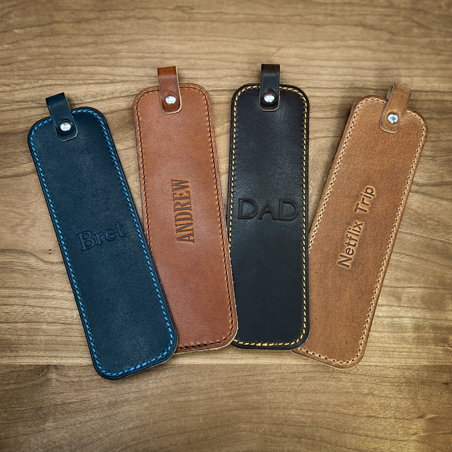 Personalized Leather Bookmarks in Blue, Black, Bourbon and Natural Dublin Horween Leathers. Handmade to order.