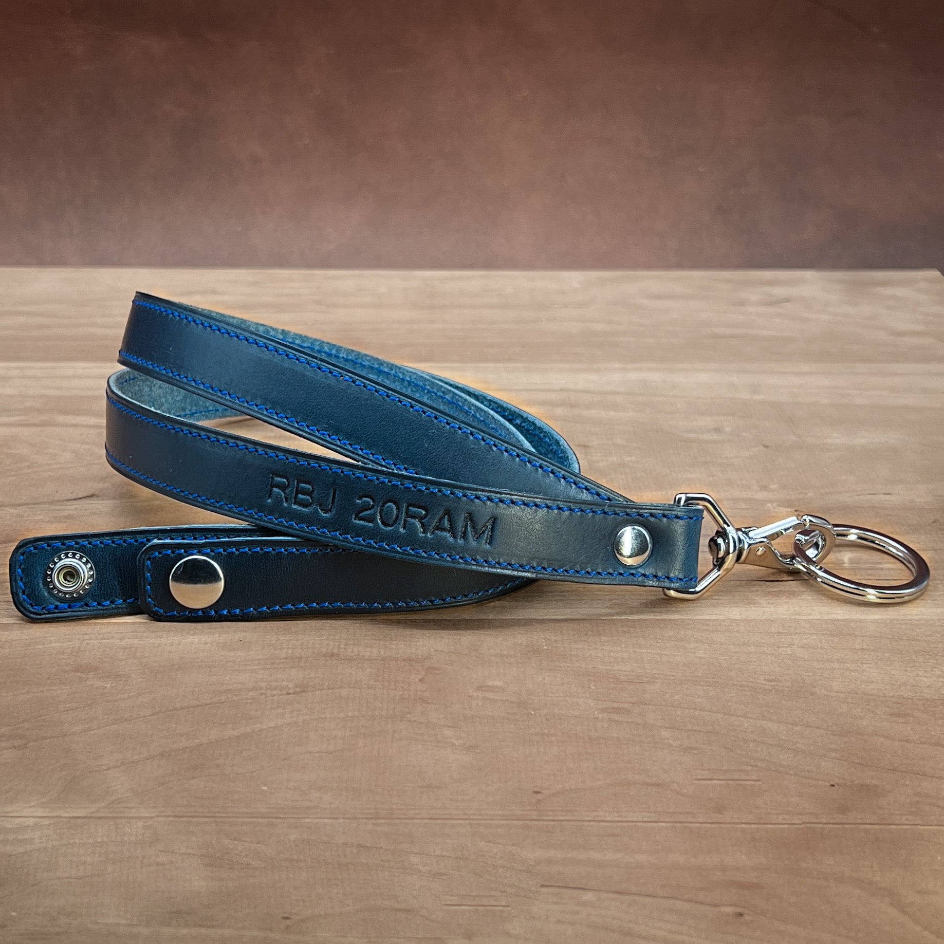 Luxury Neck Lanyard in Cobalt Blue Horween leather with nickel hardware.