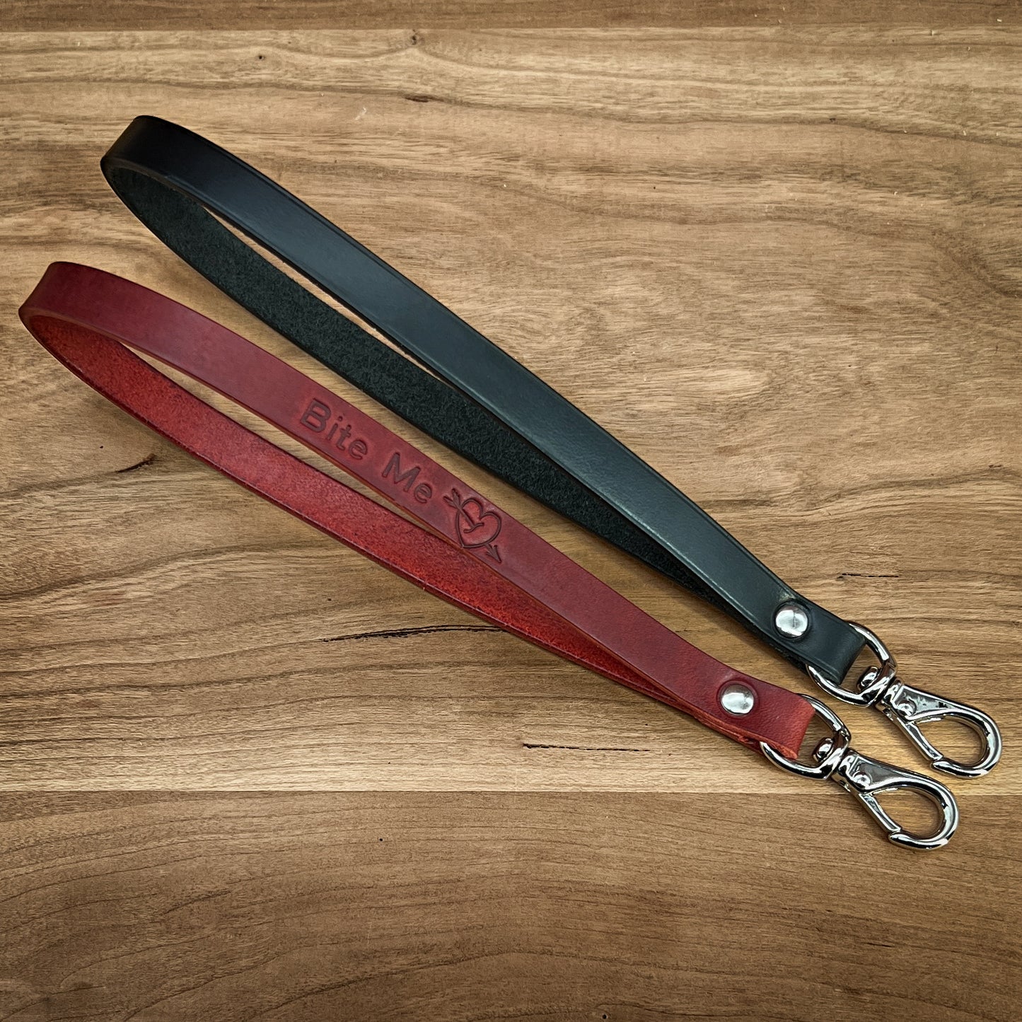 Red and Black Leather Wristlets with swivel snaps in Horween Leather. Handmade in Houston, Texas by Custom Leather and Pen