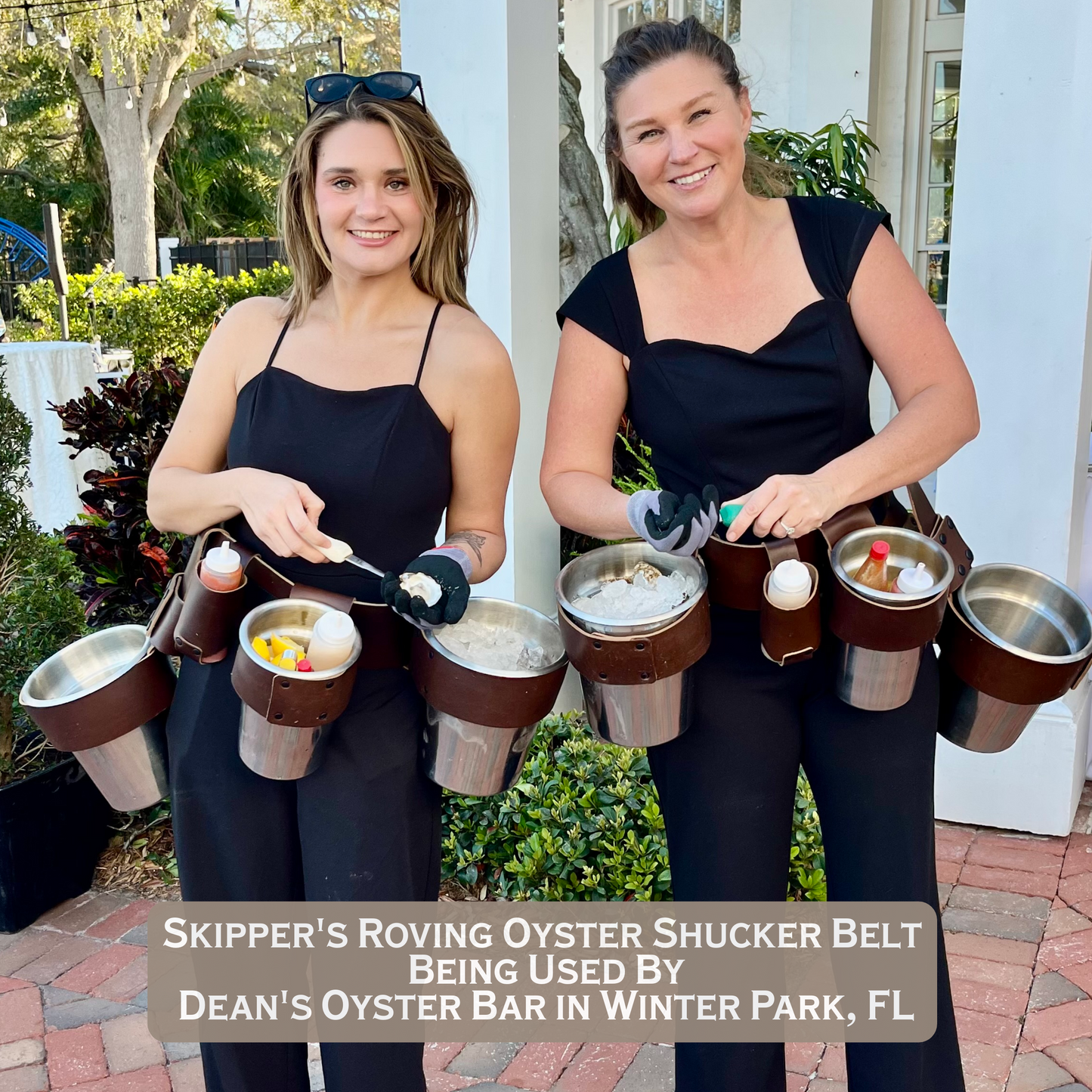 Two ladies from Dean’s Oyster Bar using a Roving Oyster Shucker Belt made by Custom Leather and Pen in Houston, Texas.
