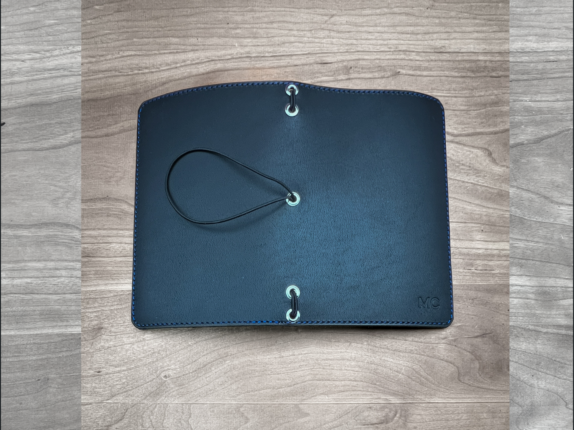 Outside view of custom leather travelers notebook in Horween leather.