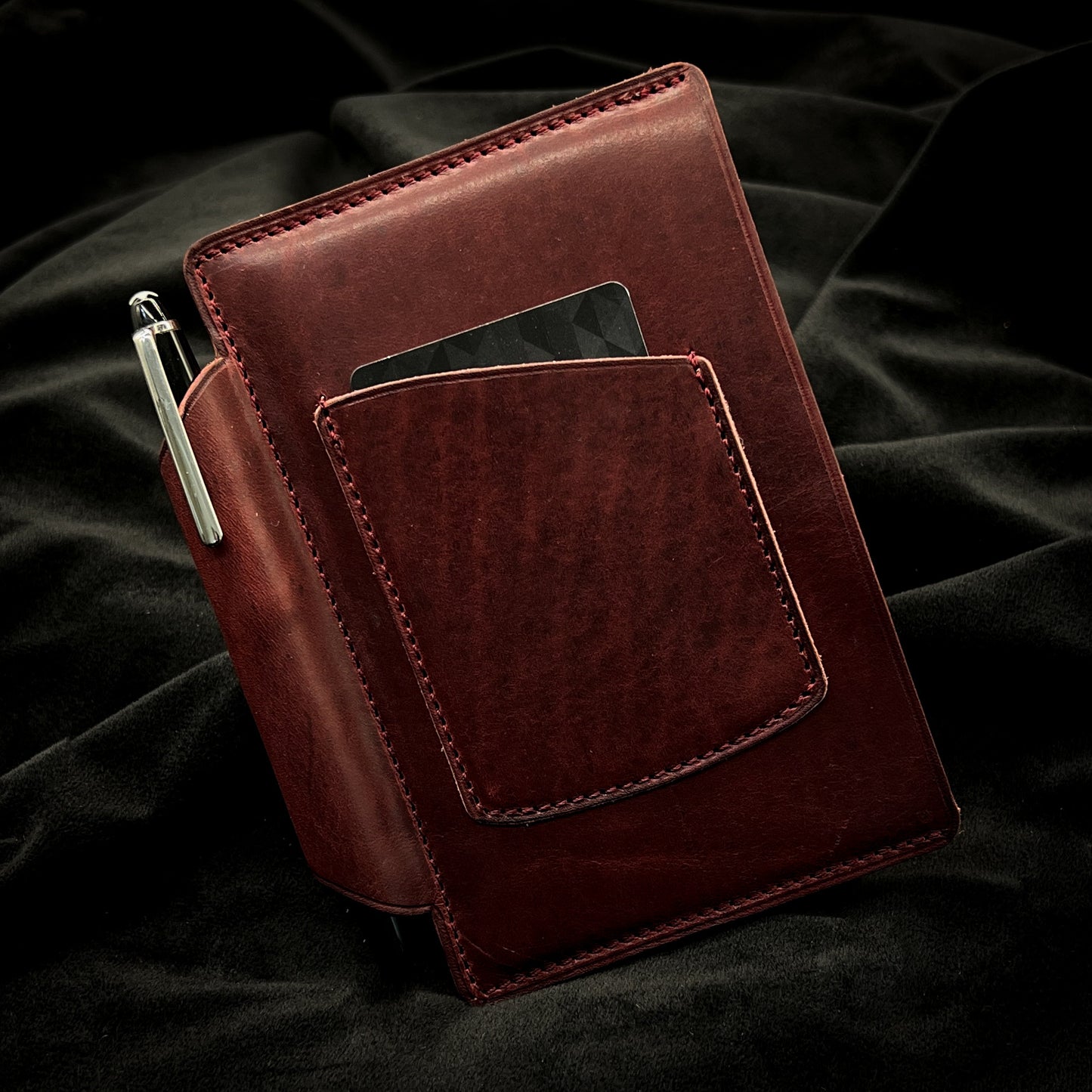 Front Cover of Pocket Notebook Sleeve Cover for 3.5x5.5 inch format notebooks in Horween leather. Handmade to order by Custom Leather and Pen in Houston, TX