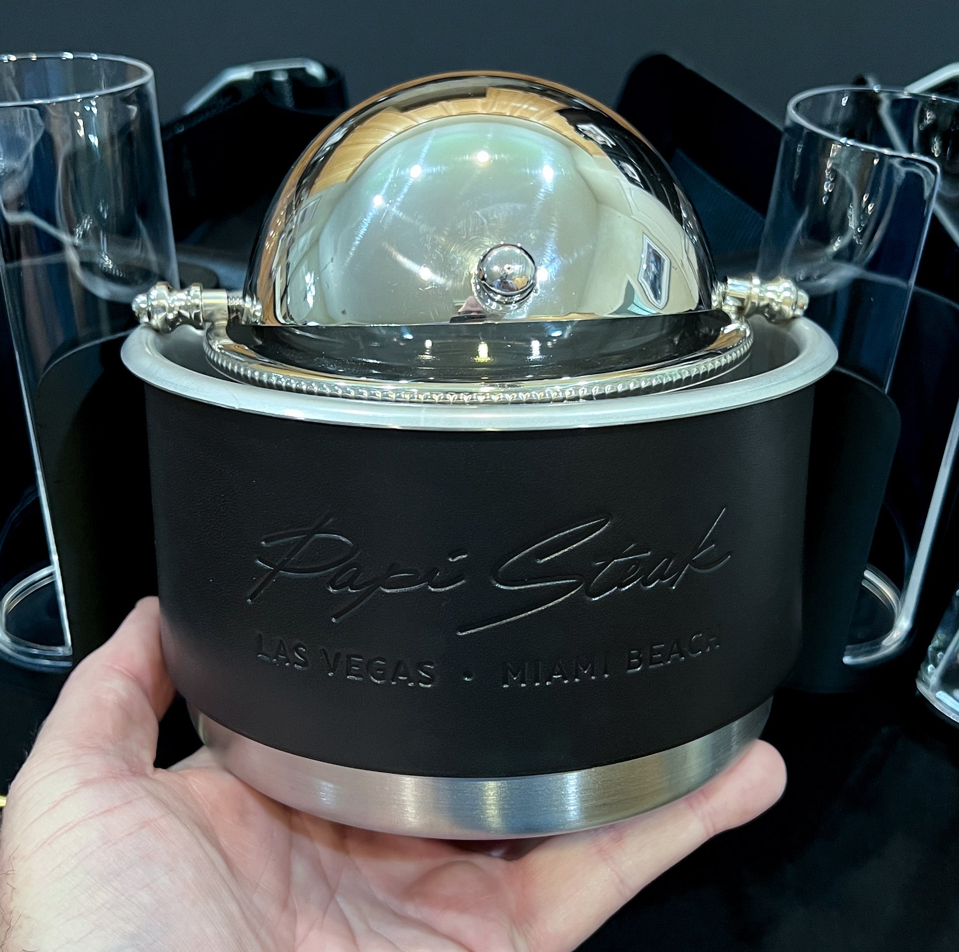 Roving Caviar Catering Equipment in Black Illini Horween leather with stainless steel rolltop caviar dish and blini holders.
