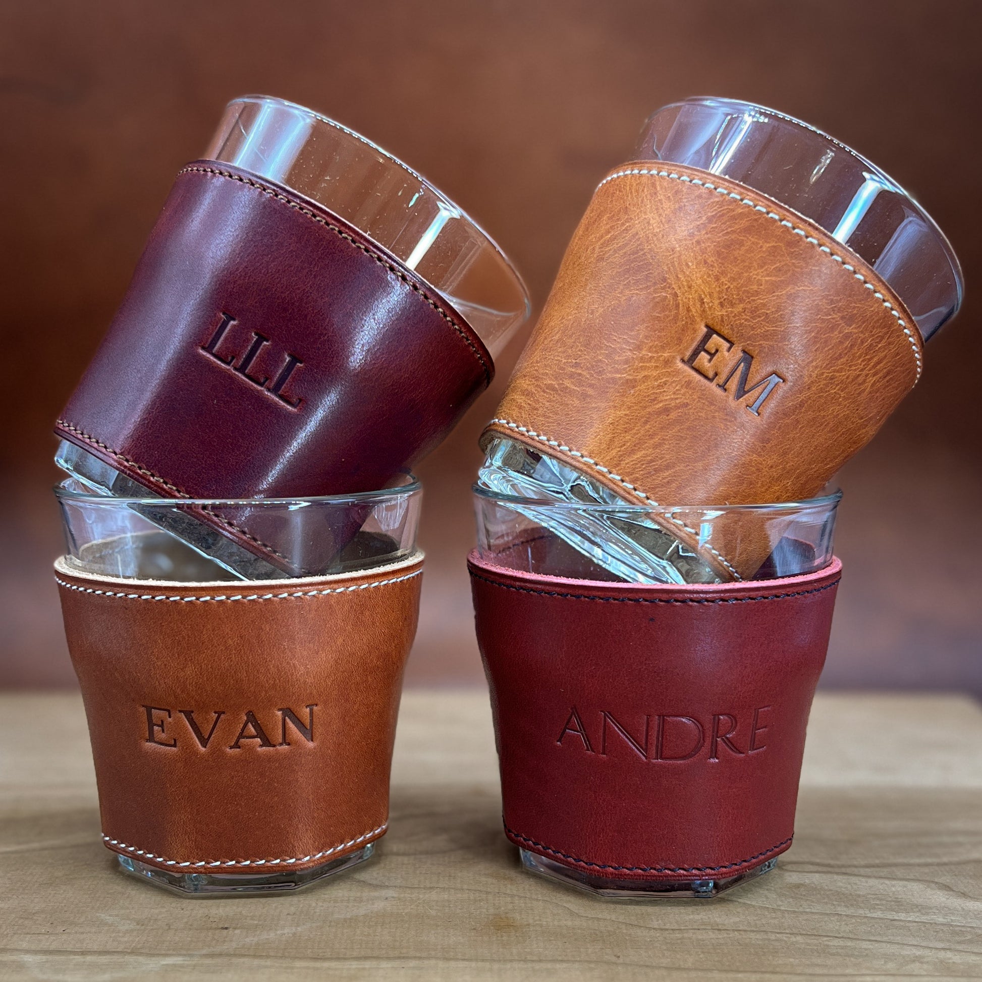 Handmade Whiskey Glasses wrapped in Horween leather including Russet Brown, English Tan, Bourbon and London Red colors.