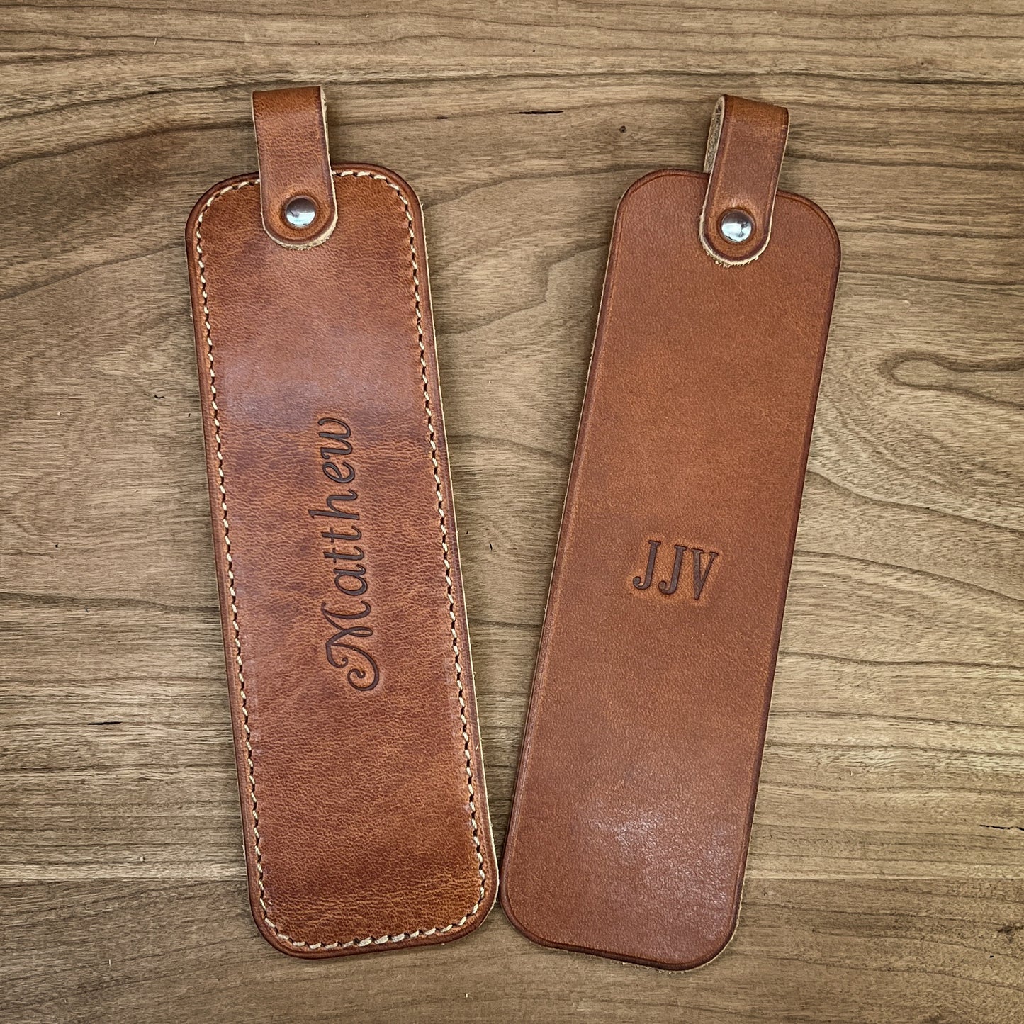 Custom Horween Leather Bookmarks with heatstamped personalization.