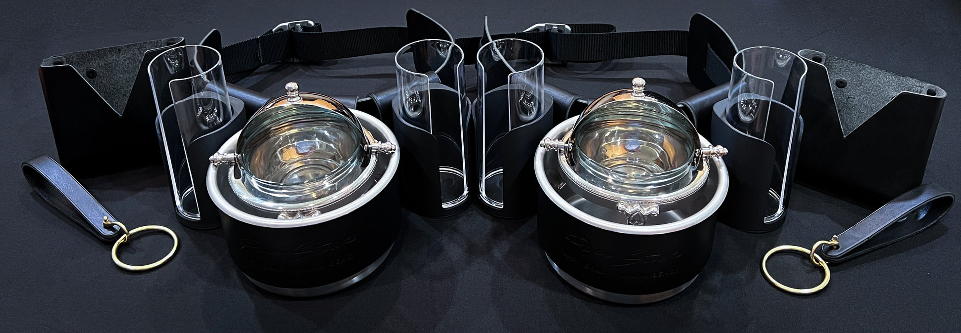 Two Mobile Caviar Catering Service Belts with Rolltop Caviar Serving Dishes, Blini Holders, Napkin Holders and Towel Holders.  Handmade in Black Horween Illini leather by Custom Leather and Pen in Houston, Texas.