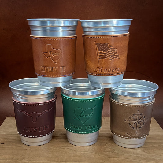 Custom Party Cups with Horween Leather Sleeves and heatstamped monograms and logos.