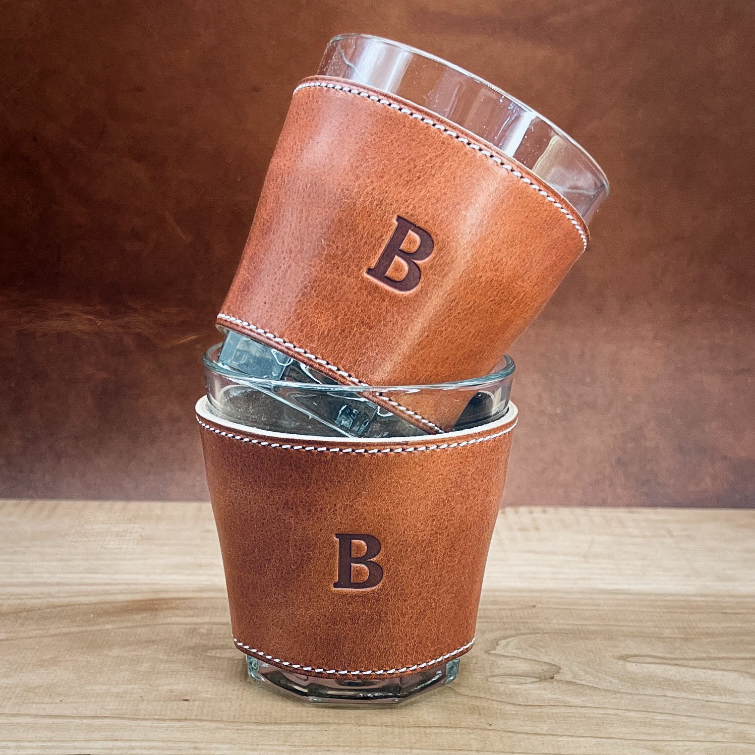 Handcrafted Whiskey Glassed with the new A72 font in English Tan Horween Leather.