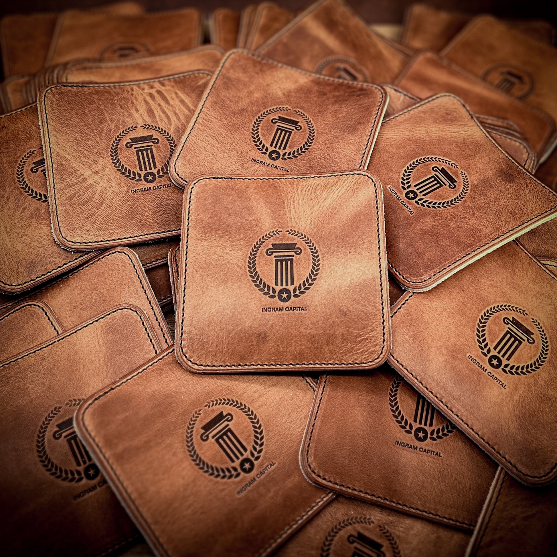 Custom drink coasters in beautiful english tan horween leather.  handmade in houston texas by Custom Leather and Pen