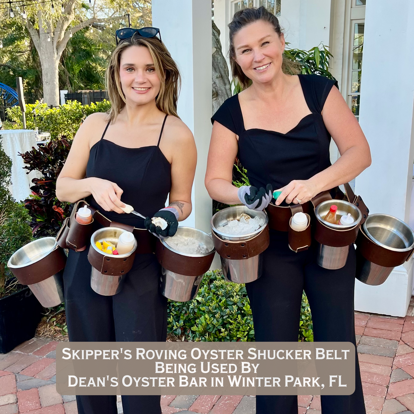 Two ladies from Dean’s Oyster Bar using a Roving Oyster Shucker Belt made by Custom Leather and Pen in Houston, Texas.  