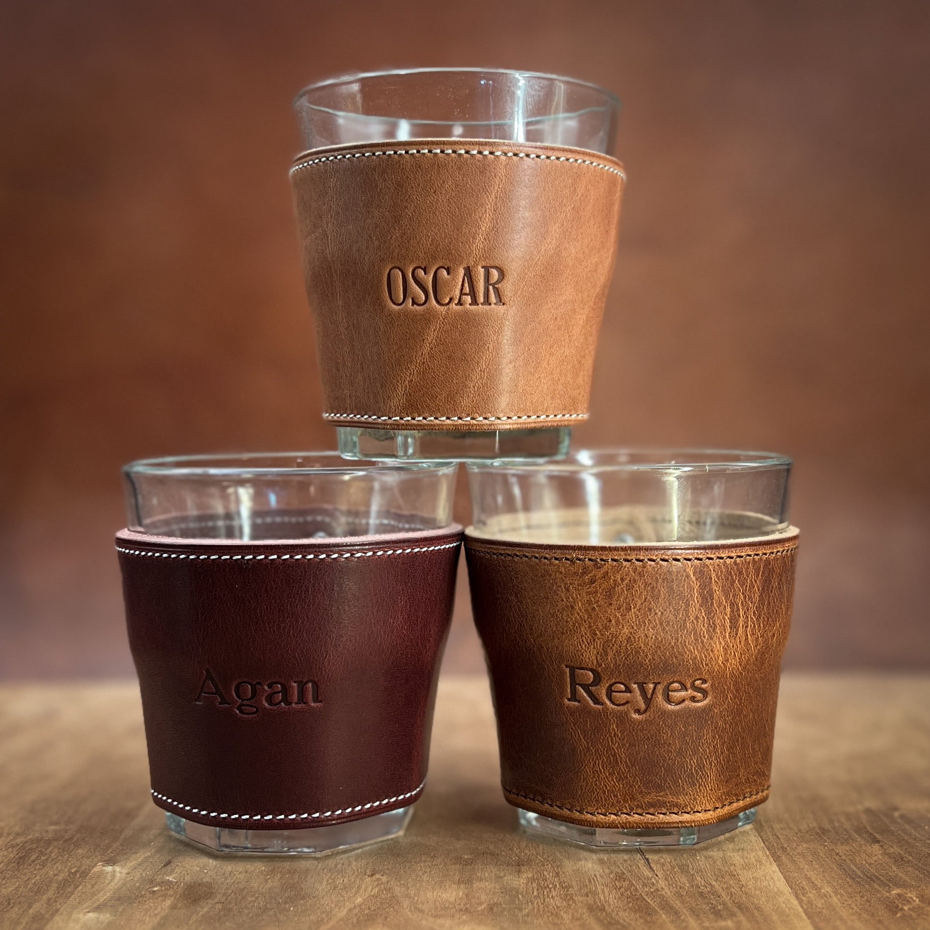 Personalized bourbon glasses in london red, natural dublin and english tan horween leather