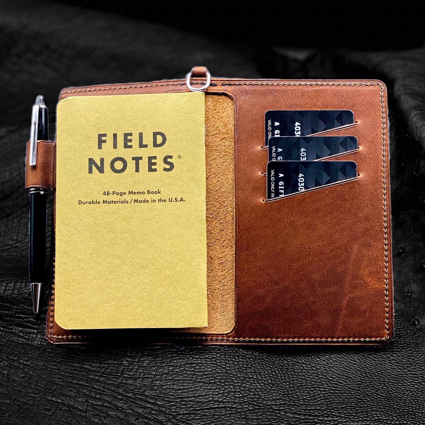 Handmade Left-handed Field Notes Journal Covers with Triple Slash Pockets in Bourbon Horween Leather | Handmade in Houston | Custom Leather and Pen