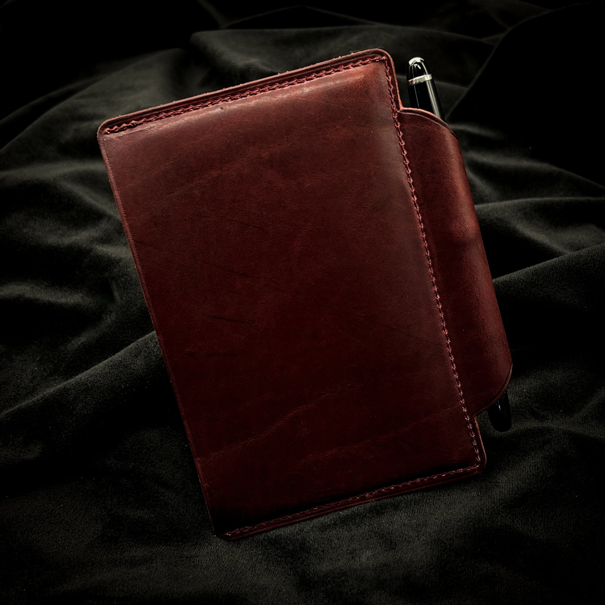 Back Cover of Pocket Notebook Sleeve Cover for 3.5x5.5 inch format notebooks in Horween leather.  Handmade to order by Custom Leather and Pen in Houston, TX