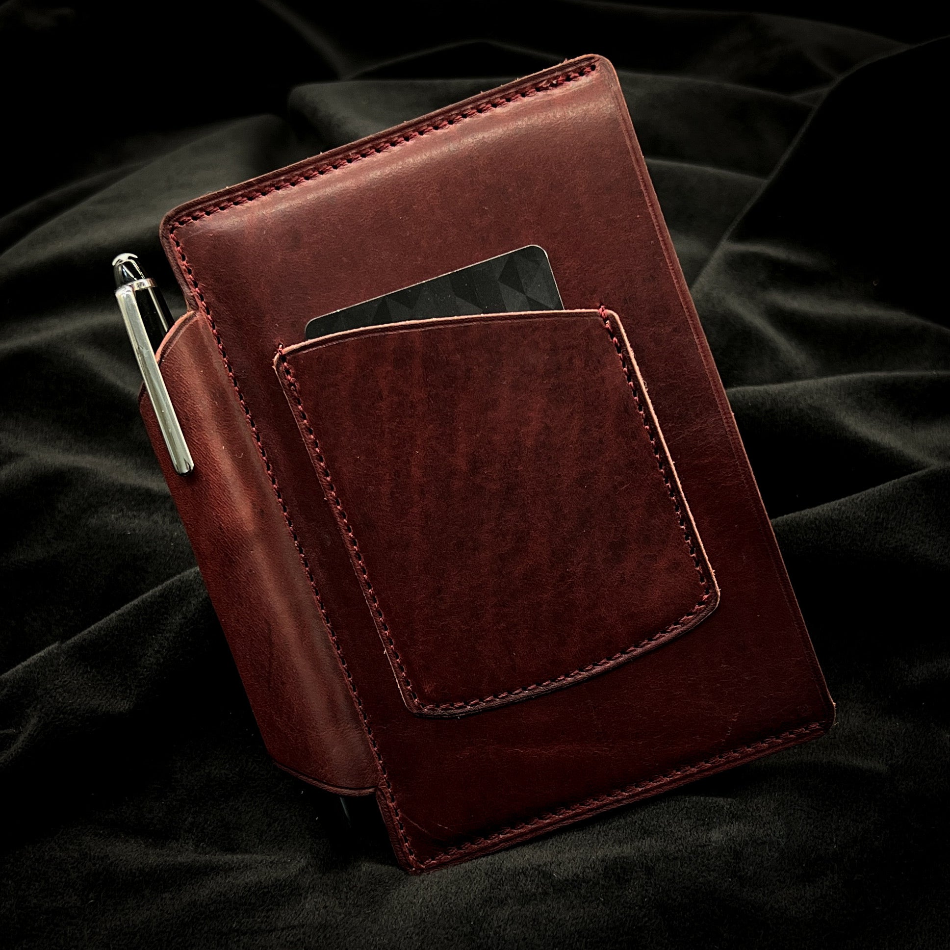 Front Cover of Pocket Notebook Sleeve Cover for 3.5x5.5 inch format notebooks in Horween leather.  Handmade to order by Custom Leather and Pen in Houston, TX