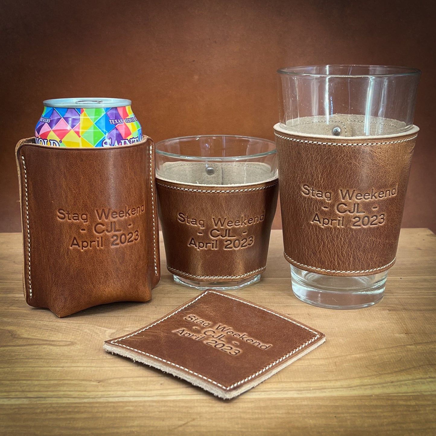 Bachelor Party Pint Glasses, Whiskey Glasses and Can Wraps in Horween leather.  Handmade to Order in Houston, TX