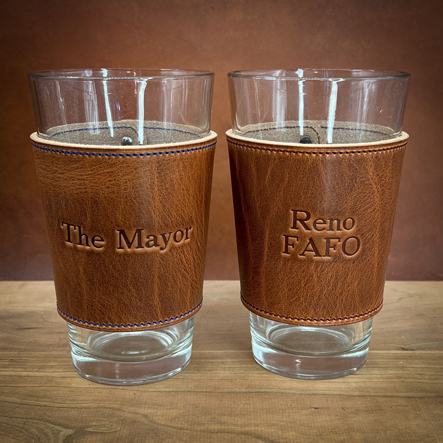 Bourbon Horween leather wrapped pint glasses.  Ready for Father's Day!  Handmade to Order in Houston TX